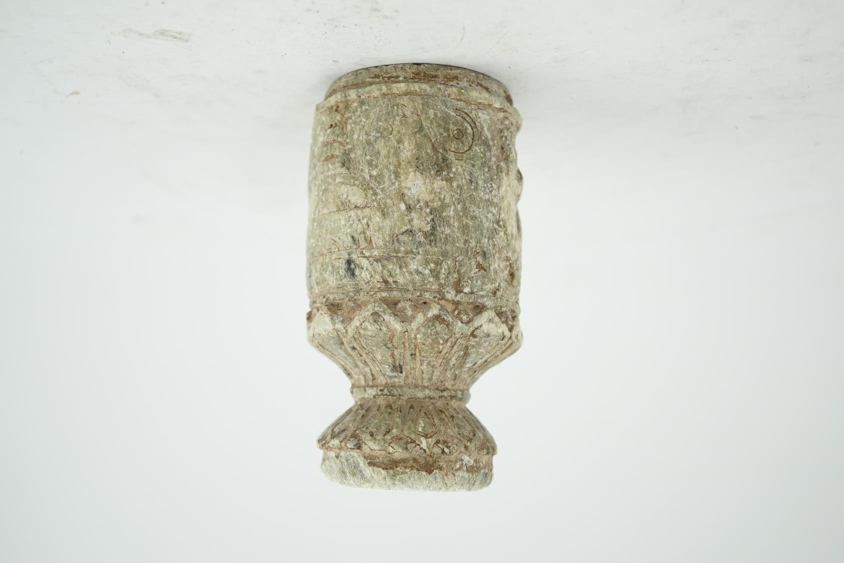 A Gandharan Buddhist carved schist stem cup